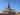 The magnificent gothic spire of the Holy Chapel towering above the surrounding buildings.